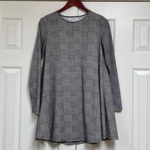 Glamorous - size Small - like new condition. From no smoking & pet free home.